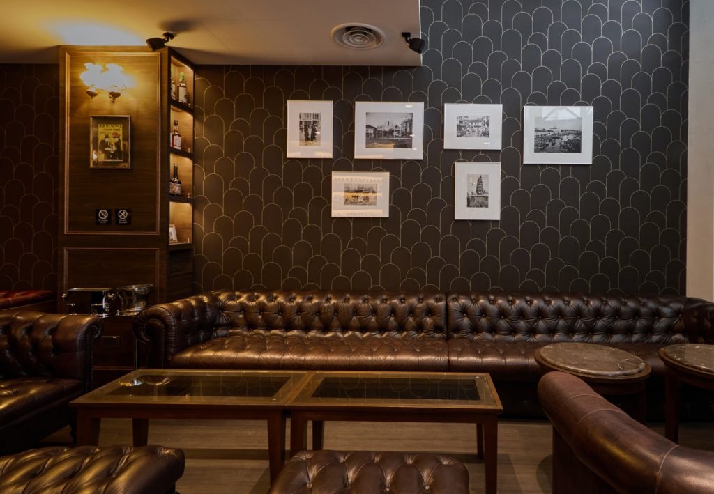 The warm cozy interior of the Library seating area of The Auld Alliance.